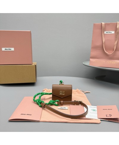 MIU MIU Leather, cord, and metal trick with mini-pouch