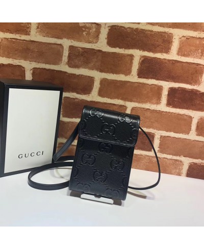 GUCCI Mini borsa con motivo GG in rilievo