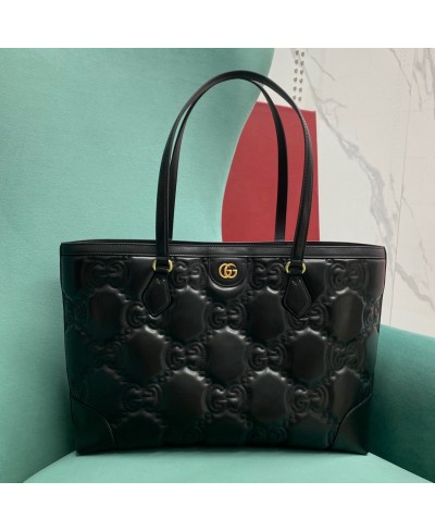 Borsa shopping in pelle matelassé con GG misura media GUCCI